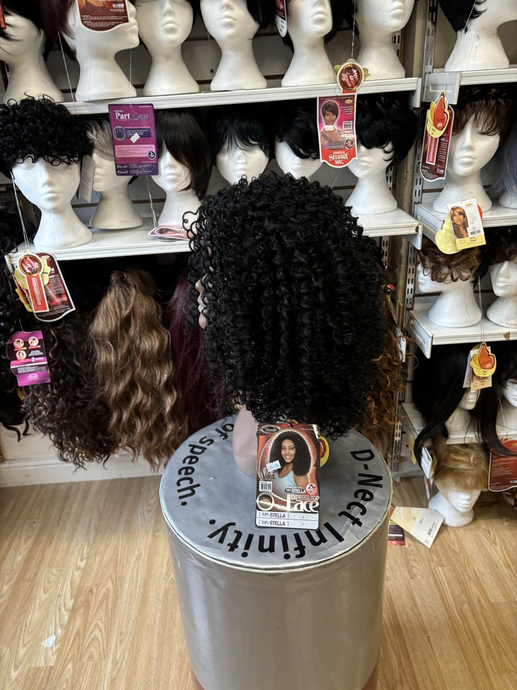 VANESSA THE FIRST NAME IN WIG TOP'S STELLA